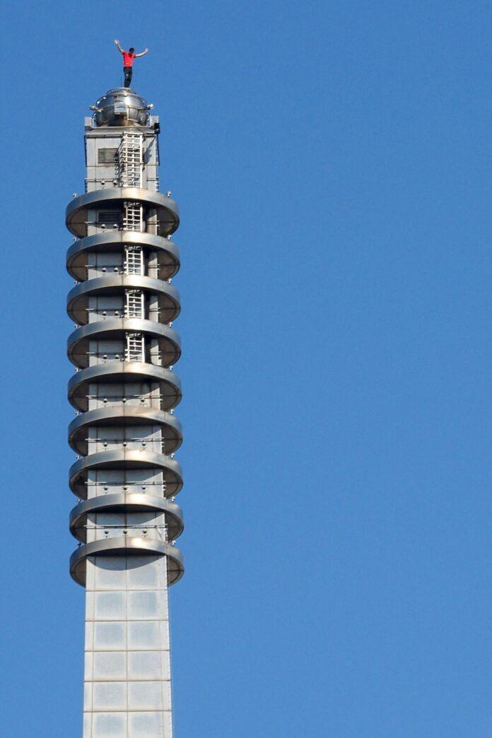 Climber Alex Honnold atop Taipei 101 after scaling the skyscraper solo in Taipei, Taiwan, January 25, 2026. REUTERS/Ann Wang