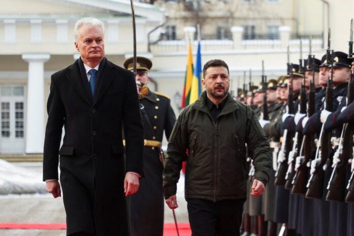 Lithuanian President Gitanas Nauseda receives Volodymyr Zelensky in Vilnius, where they thanked him for sending almost 100 generators to Ukraine.(REUTERS/Kuba Stezycki)