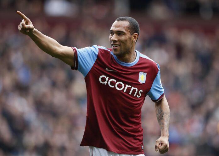 Carew celebrates a goal for Aston Villa